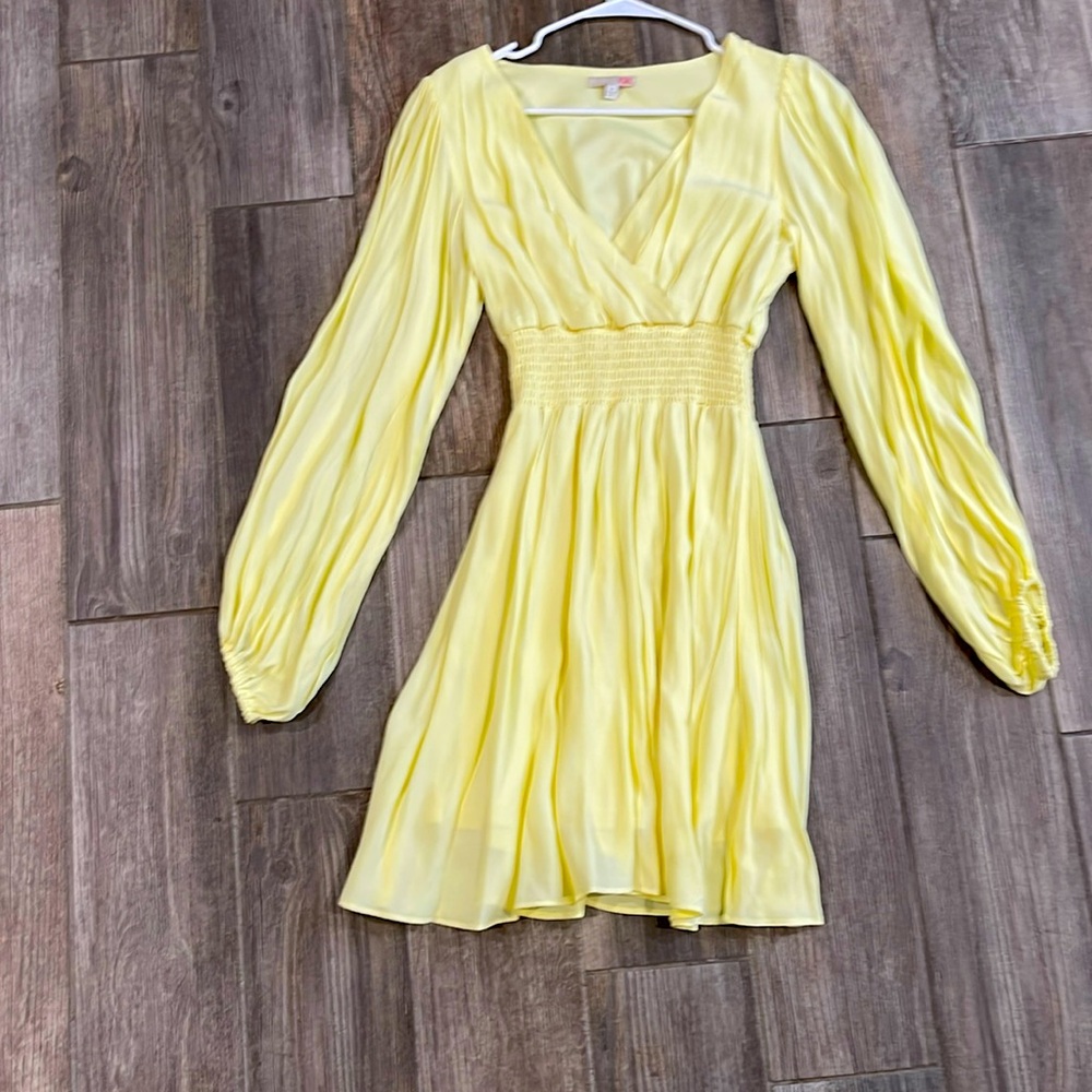 Yellow long sleeve GB Dress. It is size medium. Dress was bought and not wore.